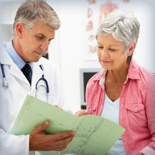 doctor consults with patient