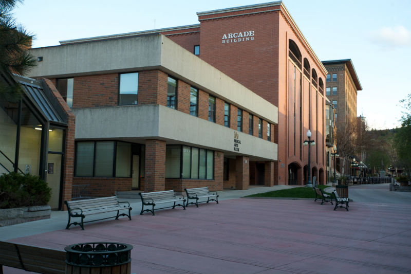 Outside of the office in brick building