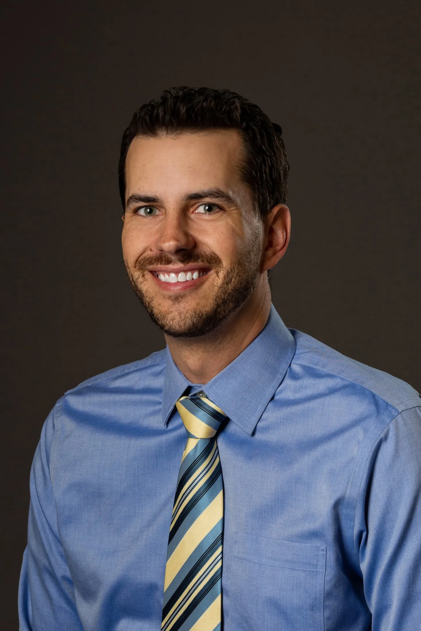 Dr. Brandon Kiesling in a button up and tie